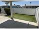 Backyard featuring a white fence and artificial turf at 6960 W Peoria Ave # 237, Peoria, AZ 85345