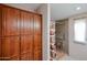 Accessible bathroom with a tiled shower, grab bars, and built-in shelving creating a safe and stylish space at 6960 W Peoria Ave # 237, Peoria, AZ 85345
