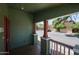 Inviting front porch with decorative supports and views of the quiet street at 6960 W Peoria Ave # 237, Peoria, AZ 85345