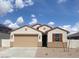 Charming single-story home with a two-car garage and neutral-colored exterior at 7320 E Hackamore Ln, San Tan Valley, AZ 85143