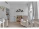 Cozy Bedroom featuring a soft chair, bookshelf, and charming decor for a warm, inviting space at 735 W Ivanhoe St, Gilbert, AZ 85233