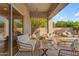 Inviting covered patio with comfortable seating and backyard views, great for relaxing and entertaining at 735 W Ivanhoe St, Gilbert, AZ 85233