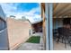 Cozy backyard with a shed and covered patio, perfect for storage and outdoor relaxation at 7513 E Roosevelt St, Scottsdale, AZ 85257