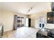 The kitchen features lots of light, a stainless steel refrigerator, and a sliding back door at 7513 E Roosevelt St, Scottsdale, AZ 85257