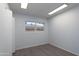 Bedroom featuring new paint, a window, and updated flooring at 7811 N 46Th Ave, Glendale, AZ 85301