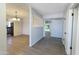 Inviting entryway with neutral paint, and lovely floors that opens to the living spaces at 7811 N 46Th Ave, Glendale, AZ 85301