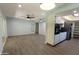 Open-concept kitchen with modern appliances, granite countertops, and access to the living area at 7811 N 46Th Ave, Glendale, AZ 85301