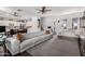 Spacious living room featuring white couch and an open floor plan at 8341 W Palo Verde Ave, Peoria, AZ 85345