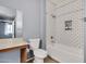 Bathroom with a white toilet and tub/shower featuring white subway tile at 10136 E Southern Ave # 1074, Mesa, AZ 85209
