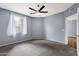 Bright bedroom with ceiling fan and ample natural light at 10136 E Southern Ave # 1074, Mesa, AZ 85209
