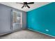 Bedroom featuring two-tone walls, carpet floors, and a ceiling fan at 10136 E Southern Ave # 1074, Mesa, AZ 85209