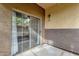 Outdoor patio with a sliding glass door at 10136 E Southern Ave # 1074, Mesa, AZ 85209