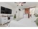 Spacious main bedroom with a sliding barn door and access to the closet at 10138 W Wood St, Tolleson, AZ 85353