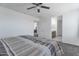 Bedroom featuring soft carpet, ceiling fan, and natural light at 10221 W Puget Ave, Peoria, AZ 85345