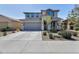 Charming two-story home featuring a well-maintained yard and a spacious two-car garage in a suburban neighborhood at 10221 W Puget Ave, Peoria, AZ 85345