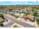 Overhead shot of a neighborhood street featuring houses with manicured yards and desert flora at 10836 N 108Th N Pl, Scottsdale, AZ 85259