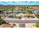 Straight-on aerial view of a quiet street with single-Gathering homes and tidy desert landscaping at 10836 N 108Th N Pl, Scottsdale, AZ 85259