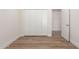 Comfortable bedroom with hardwood floors and large closet at 10836 N 108Th N Pl, Scottsdale, AZ 85259