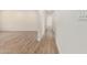 Bright hallway features durable, light wood flooring that seamlessly connects to other areas of the home at 10836 N 108Th N Pl, Scottsdale, AZ 85259