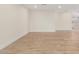 Large living room featuring new wood floors, neutral walls, and recessed lighting at 10836 N 108Th N Pl, Scottsdale, AZ 85259