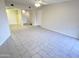 Spacious living room featuring neutral tones and tile flooring for a clean and modern look at 12222 N Paradise Village S Pkwy # 409, Phoenix, AZ 85032