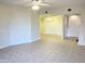 Inviting living room with tile floors and open layout, perfect for entertaining and relaxation at 12222 N Paradise Village S Pkwy # 409, Phoenix, AZ 85032