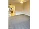 Spacious main bedroom with soft carpeting and convenient access to the en-suite bathroom at 12222 N Paradise Village S Pkwy # 409, Phoenix, AZ 85032