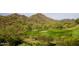 Picturesque desert golf course with lush green fairways and natural desert landscaping at 12526 S 176Th Ave, Goodyear, AZ 85338