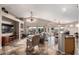 Inviting living room with high ceilings, stylish furnishings, and access to the outdoor patio at 12526 S 176Th Ave, Goodyear, AZ 85338
