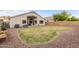 Spacious backyard featuring a grassy area, perfect for outdoor activities and entertaining at 1289 E Baker Dr, San Tan Valley, AZ 85140