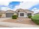Charming single-story home featuring manicured landscaping and a neutral color palette at 1289 E Baker Dr, San Tan Valley, AZ 85140