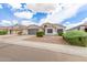 Inviting single-story home featuring a neat front yard and attached two-car garage at 1289 E Baker Dr, San Tan Valley, AZ 85140