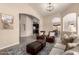 Open-concept living room with neutral color palette and stylish furnishings at 1289 E Baker Dr, San Tan Valley, AZ 85140