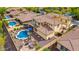 A lush backyard view with patio areas, pristine pool, and desert landscaping at 13336 W Via Caballo Blanco --, Peoria, AZ 85383