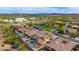 Wide aerial view showcasing a planned residential community with well-manicured landscapes and scenic mountain backdrops at 13336 W Via Caballo Blanco --, Peoria, AZ 85383