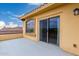 A private balcony featuring a sliding glass door and arched window, perfect for enjoying outdoor views at 13336 W Via Caballo Blanco --, Peoria, AZ 85383