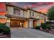 Charming two-story home with a covered car port, desert landscaping and concrete driveway at 13336 W Via Caballo Blanco --, Peoria, AZ 85383