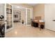 Bright office space featuring French doors and a view of the living room at 13336 W Via Caballo Blanco --, Peoria, AZ 85383