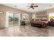 Spacious main bedroom with a private balcony and a seating area at 13336 W Via Caballo Blanco --, Peoria, AZ 85383