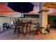 Outdoor kitchen features bar seating and built-in grill at 13336 W Via Caballo Blanco --, Peoria, AZ 85383