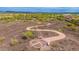 Community walking path with desert vegetation and a mosaic landmark as well as mountain views at 13336 W Via Caballo Blanco --, Peoria, AZ 85383