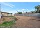 Large backyard with a block wall, shed, and covered patio, perfect for outdoor activities at 1410 W Morrow Dr, Phoenix, AZ 85027