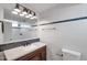 Stylish bathroom with a custom vanity, updated fixtures, and modern tiling, blending functionality with style at 1410 W Morrow Dr, Phoenix, AZ 85027