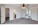 Generous bedroom featuring soft carpeting, neutral tones, and en-suite access, perfect for relaxation and privacy at 1410 W Morrow Dr, Phoenix, AZ 85027