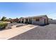 Charming single-story home with desert landscaping, gravel yard and walkway at 14842 N 36Th St, Phoenix, AZ 85032