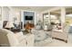 Bright living room with large windows, plush seating, and elegant rug at 156 E Leverenz Ave, Queen Creek, AZ 85140