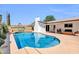 Backyard oasis showcasing a pristine pool with a patio area perfect for entertaining at 1643 W Harmont Dr, Phoenix, AZ 85021