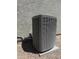 Energy-efficient air conditioner unit on a gravel pad ensures comfortable indoor temperatures year-round at 17985 W Jojoba Rd, Goodyear, AZ 85338