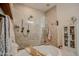 Stylish bathroom with a soaking tub and separate glass-enclosed shower at 17985 W Jojoba Rd, Goodyear, AZ 85338