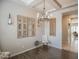 Dining area featuring a modern chandelier, neutral color palette and decorative wall accents at 17985 W Jojoba Rd, Goodyear, AZ 85338